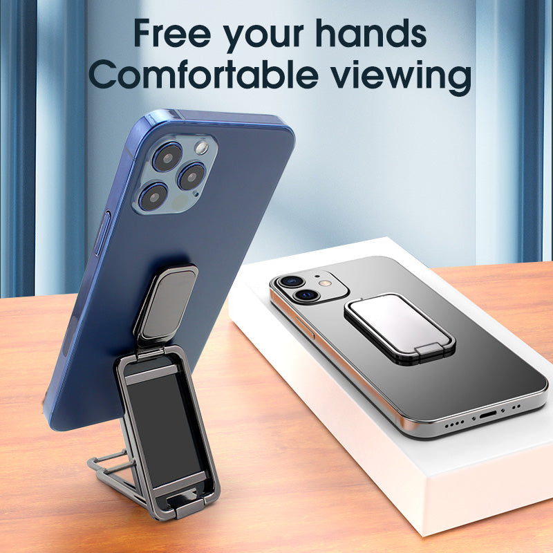 Foldable magnetic phone stand holding a smartphone on a desk
